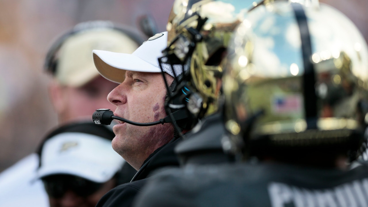 Louisville interim coach says last 2 games not 'about me'